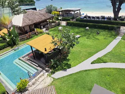 an aerial view of a backyard with a swimming pool at Mama Beach Residence - Adults Only in Phi Phi Don