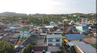 an aerial view of a town with houses at The Endless Bangtao Apartment AC1234 in Bang Tao Beach