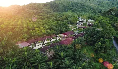 an aerial view of a house in the middle of a mountain at De Malee Pool Villas in Ao Nang Beach