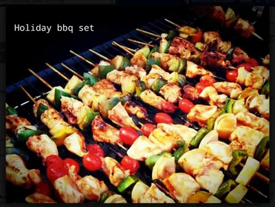 a bunch of food is cooking on a grill at Two Villas HOLIDAY - Oxygen Style Bangtao Beach, Phuket in Bang Tao Beach