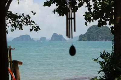 a view of the water with mountains in the background at KhaoTong Villa at Melina's in Tha Lane Bay
