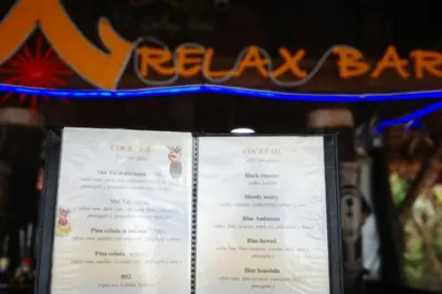 a view of the menu of a restaurant at Phi Phi Relax Beach Resort in Phi Phi Don