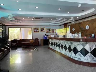 a waiting room with a bar in a restaurant at Phi Phi Andaman Beach Resort in Phi Phi Don