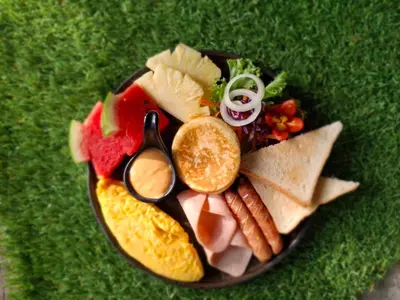 a plate of food with different types of food at Phi Phi Andaman Legacy Resort in Phi Phi Don