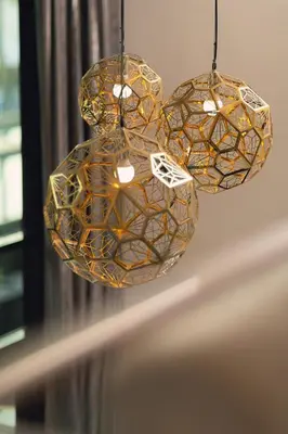 a group of lights hanging from a ceiling at The Aristo by Holy Cow, 4-BR loft, 150 m2, pool view in Surin Beach