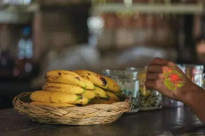 a basket of bananas sitting on a table at Phi Phi Sunset Bay Resort in Phi Phi Don