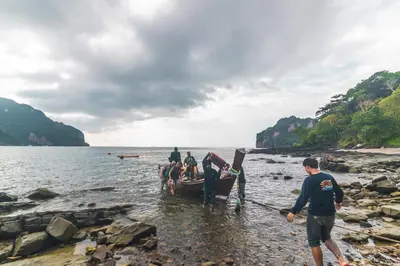 a group of people on a boat in the water at Phi Phi Sunset Bay Resort in Phi Phi Don