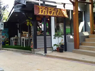 a restaurant with a sign on the front of it at Phi Phi Inn in Phi Phi Don
