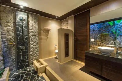 a bathroom with a sink and a toilet in it at Hidden Pool Villa A Hidden Haven Just For You in Rawai Beach