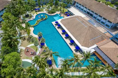 an overhead view of a pool at a resort at NH Boat Lagoon Phuket Resort in Phuket Town
