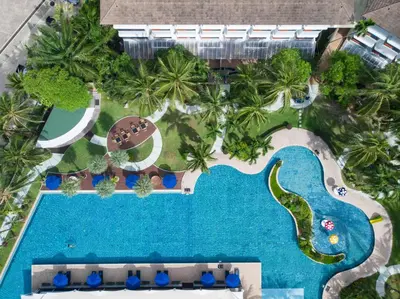 an overhead view of the pool at the resort at NH Boat Lagoon Phuket Resort in Phuket Town