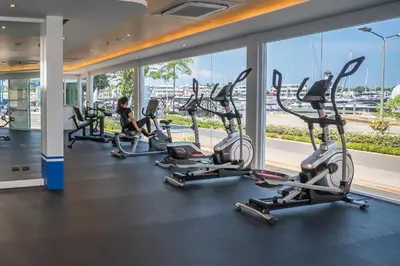 a row of exercise bikes in a gym at NH Boat Lagoon Phuket Resort in Phuket Town