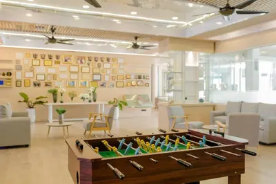 a large office with a foosball table in a room at NH Boat Lagoon Phuket Resort in Phuket Town