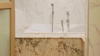 a bathroom with a shower with a white sink at Days Inn by Wyndham Aonang Krabi in Ao Nang Beach
