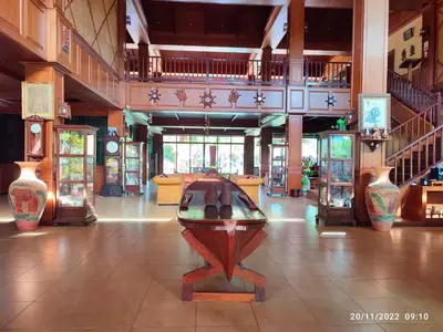 a room with vases on display in a building at Andamanee Boutique Resort Aonang Krabi - Free Beach Shuttle in Ao Nang Beach