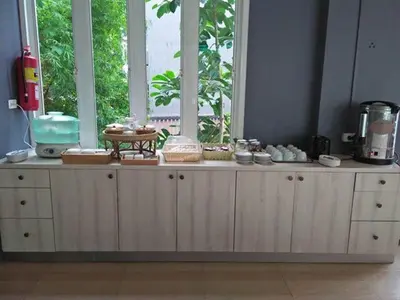 a counter in a room with a window at Aonang Village Resort in Ao Nang Beach