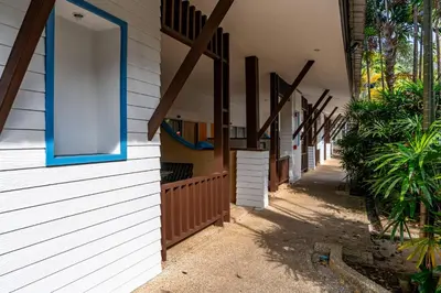 a row of windows on the side of a building at Ao Nang Timber House in Ao Nang Beach