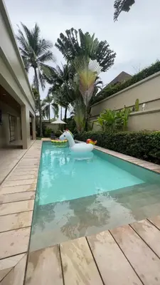 a swimming pool with a rubber duck in the water at The Residence Resort in Bang Tao Beach