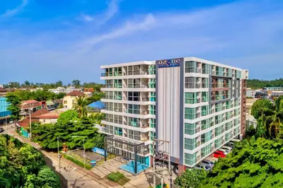 an aerial view of a building in a city at Ozone Condotel by RESAVA in Kata Beach