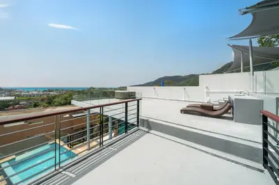 a view from the roof of a house with a swimming pool at Kamala Sea View-villa with private pool and maid in Kamala Beach