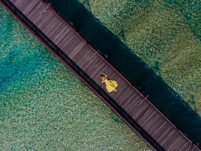an overhead view of a banana on a water slide at The Hotspring Beach Resort & Spa - SHA Extra Plus in Natai Beach