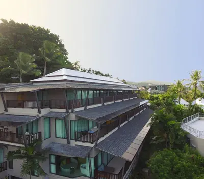 an aerial view of a building with a balcony at Andaman Cannacia Resort & Spa - SHA Extra Plus in Kata Beach