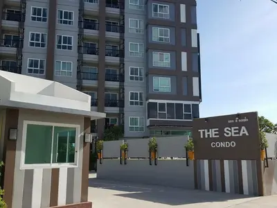 a building with a sign that says the sea corolla at The Sea Condo Cozy Private Room at Ao nang Krabi in Ao Nang Beach