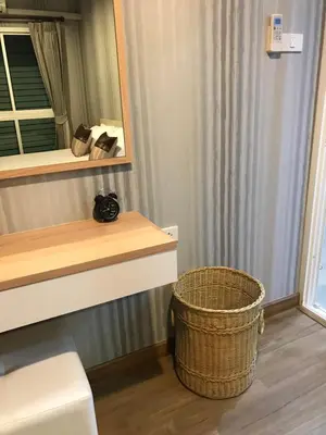 a bathroom with a mirror and a trash can at The Sea Condo Cozy Private Room at Ao nang Krabi in Ao Nang Beach