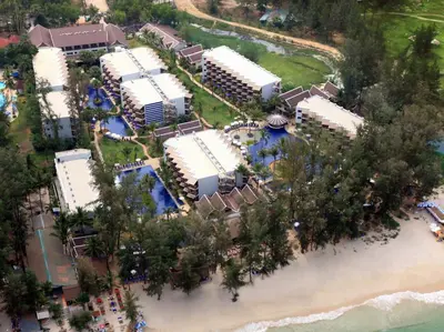 an aerial view of a resort on the beach at Sunwing Bangtao Beach in Bang Tao Beach