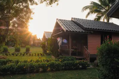 a small pink house with a roof on a yard at Cocco House in Ao Nang Beach