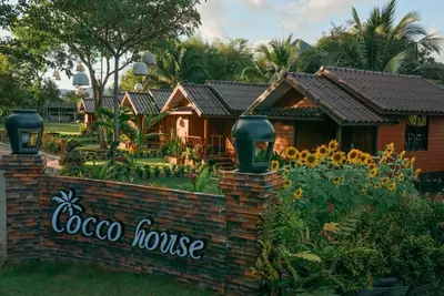 a resort with a sign that reads coco house at Cocco House in Ao Nang Beach