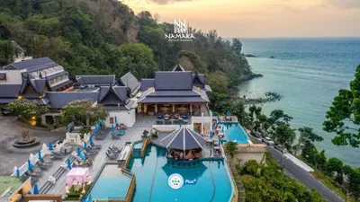 an aerial view of a resort next to the ocean at Namaka Resort Kamala in Kamala Beach
