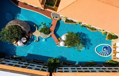 an overhead view of a swimming pool at a resort at Patong Paragon Resort & Spa SHA Extra Plus in Patong Beach
