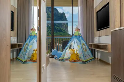 a childs room with a room with a play tent at Holiday Inn Resort Krabi Ao Nang Beach by IHG in Ao Nang Beach