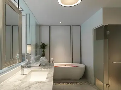 a bathroom with a bath tub and a sink at Chanalai Romantica Resort - Adults Only, Kata Beach in Kata Beach