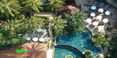 an overhead view of a pool at a resort at Karona Resort & Spa - SHA Extra Plus in Karon Beach