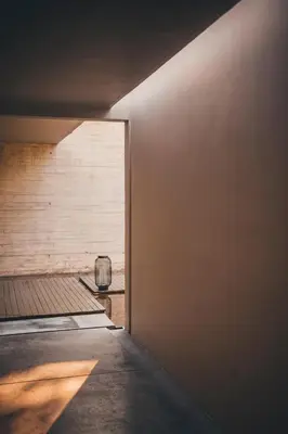 an opening in a room with a wall at SALA Phuket Mai Khao Beach Resort in Mai Khao Beach