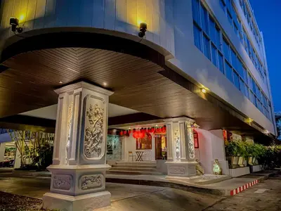 a building with a staircase in front of a building at Sino House Phuket Hotel - SHA Plus in Phuket Town