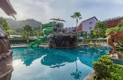 a pool with a water slide at a resort at Ananta Burin Resort in Ao Nang Beach