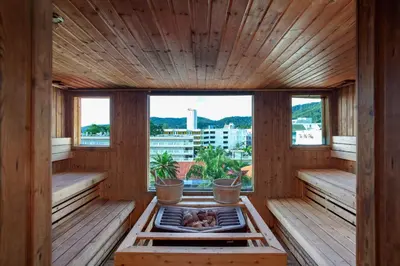a sauna with a view of a city at Baumancasa Beach Resort in Karon Beach