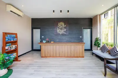 a lobby of a pharmacy with a counter and a pharmacyacist at Signature Phuket Resort in Chalong