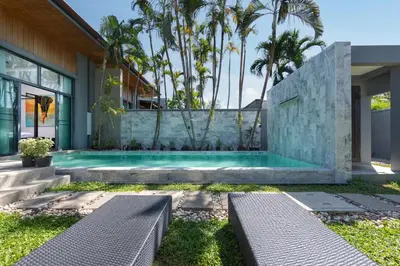 a swimming pool in the backyard of a house at VILLA Galam 2BR Private Pool Naiharn beach in Nai Harn Beach