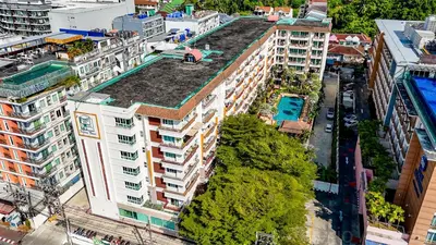 an overhead view of a building with a pool on the roof at Phuket Villa Patong Beach by PHR in Patong Beach