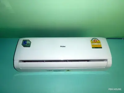 a white printer sitting on top of a table at Pek House in Phuket Town