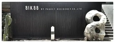 a building with a statue in front of it at 8IK88 Resort, Phuket - SHA Extra Plus in Por Bay