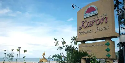 a sign for a hotel on the beach at Karon Princess Hotel SHA EXTRA Plus in Karon Beach