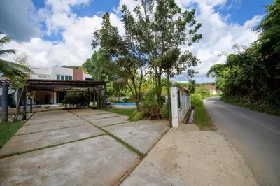 an empty road in front of a house at Villa Kanwara in Ao Nang Beach