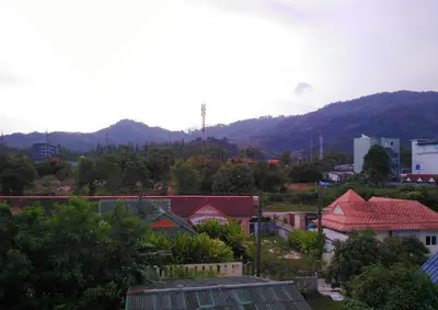 a view of a city with mountains in the background at Soi Bang thao 2 Aircon Studio in Bang Tao Beach