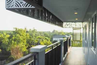 a balcony of a house with a view at APA-TREE Boutique Hotel in Natai Beach