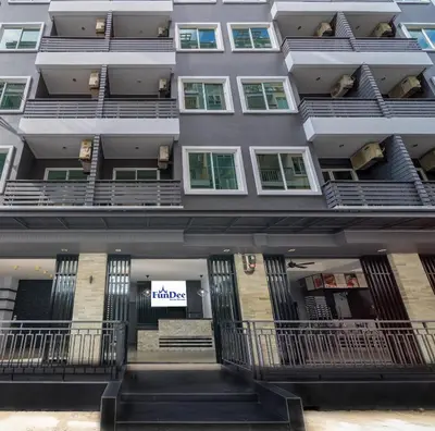 an external view of a building with balconies at FunDee Boutique Hotel in Patong Beach